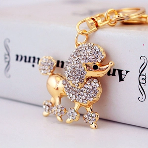 Sparkly crystal poodle keychain with gold finish for women bag charm and accessories