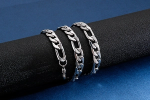 Detailed view of 9mm stainless steel NK Cuban link chains with polished silver finish