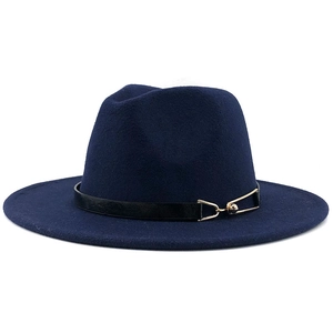 Detail view of navy blue wool fedora hat featuring a black leather band and gold buckle