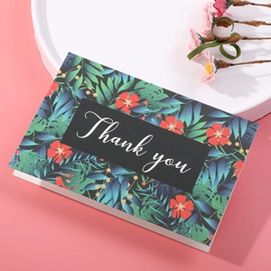 Detail of floral Thank You card with tropical hibiscus design on a pink background