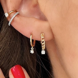 S925 silver needle twisted hoop earrings set with zircon stones on female model