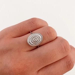 Vintage punk silver evil eye ring with retro sun relief pattern on finger