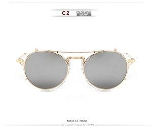 Detail view of the metal sunglasses hinge featuring a decorative cross pattern