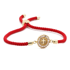 Adjustable red braided rope bracelet with a gold-tone colorful zircon cross charm pendant