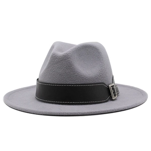 Detail of dark grey wool fedora hat featuring flat brim and black leather belt with buckle