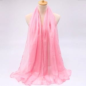 Detail of light pink voile scarf with lightweight semi-transparent texture on mannequin