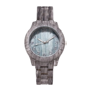 Bamboo pattern wood watch with dark grey wooden strap and light blue dial on white background