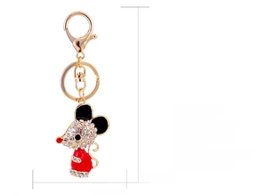 Detail showing dimensions of a red zodiac mouse keychain with sparkling white rhinestones