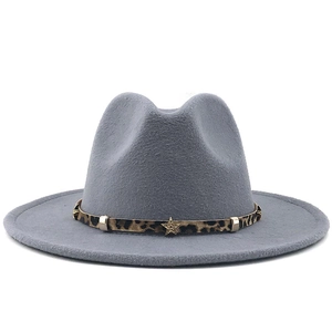 Close-up of grey wool fedora hat featuring leopard print band with gold star accents