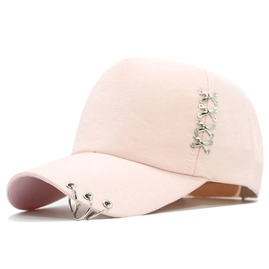Light pink baseball cap with silver metal rings and cross decorative buckles on side