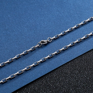 Polished silver stainless steel box chain necklace with lobster clasp close-up detail