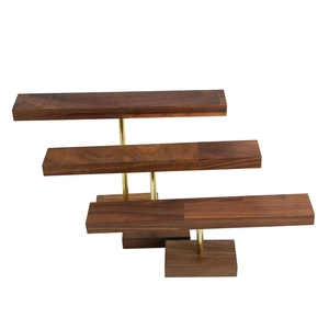 Three-tier walnut wood and gold metal jewelry display stand for necklaces and bracelets