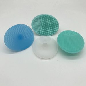 Silicone oval facial brushes showing soft bristles and suction cup handles in various colors