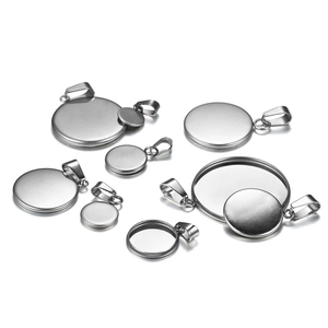 Assorted circular metal pendant trays and snap bails for DIY jewelry making in various sizes