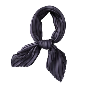 Solid charcoal grey pleated silk-like scarf with fine accordion folds and tied knot