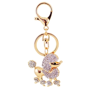 Sparkling crystal poodle keychain with golden lobster clasp on a clean white background