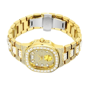 Detailed macro of gold iced-out watch with crystal rhinestones and stainless steel clasp