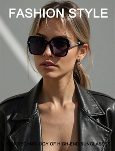 Detail of square oversized sunglasses with metallic hinge decor on a fashion model