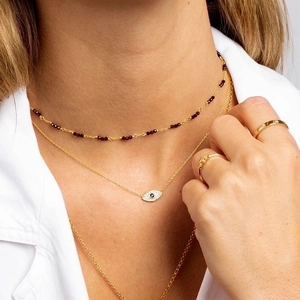 S925 silver evil eye pendant necklace with gold beaded chain for a layered luxury look