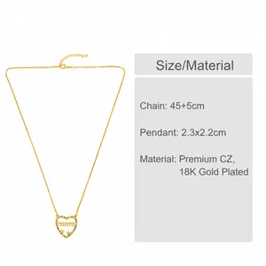 Macro-opname van gouden hartketting met momma-letters en zirkonia-stenen