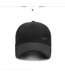 Detail view of the breathable mesh fabric and sport text on this black baseball cap