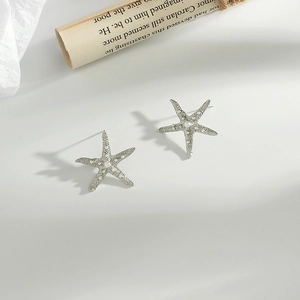 Silver starfish stud earrings with white pearls and matte finish for women