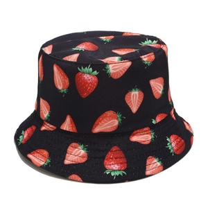 Detail of multi-row stitching on brim of black cotton bucket hat with strawberry print