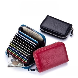 Detail of RFID blocking leather card holder with 12 slots and secure zipper closure