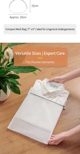 Detail of a white fine mesh laundry bag for bras with a zipper protector and shell shape