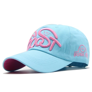 Detail of 3D embroidery with PUSH ME lettering on a light blue cotton baseball cap