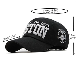 Detail view of cotton baseball cap with white Boston 3D embroidery and side shield logo