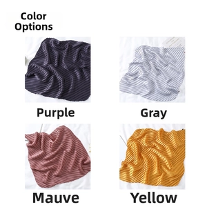 Detailed grid of pleated faux silk scarves in purple, grey, dusky rose, and yellow colors