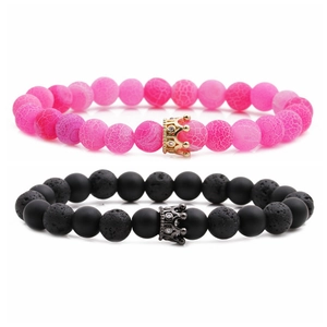 Couples crown bracelet set with matte black stone and pink cracked beads on white background