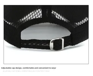 Close-up of black breathable mesh hat with adjustable silver metal buckle on the back