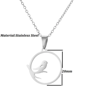 Detailed macro view of 20mm round stainless steel bird on branch hollow pendant necklace