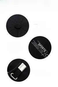 Detail view of black sports baseball cap featuring adjustable metal buckle and stitching