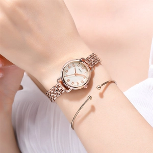 Elegant rose gold women's quartz watch with a slim metal strap and matching bracelet