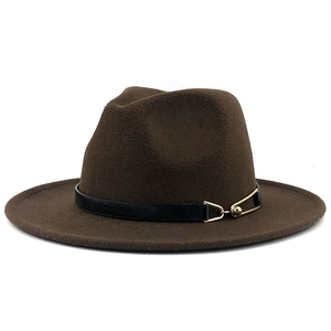 Detailed macro view of dark brown wool fedora hat with black leather band and gold buckle