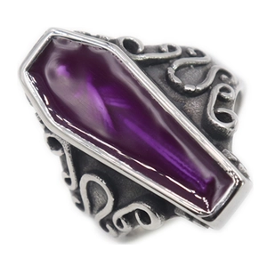 Gothic silver stainless steel coffin ring with purple gemstone on white background
