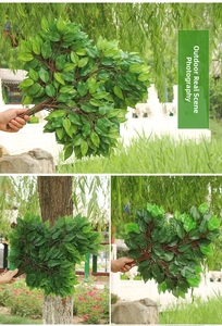 Close-up of realistic artificial banyan leaves with natural veins and green foliage detail