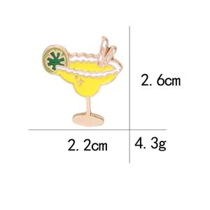 Cartoon cocktail enamel pin with lemon and straw details, size 2.6cm by 2.2cm