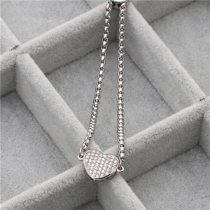 Verstellbares Herzarmband aus Edelstahl mit glitzerndem Zirkonia-Pavé für Damen
