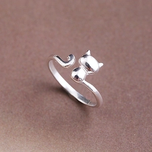 Minimalist silver cat open ring with adjustable band featuring cat head and tail design