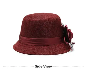 Side view of wine red cloche hat with textured weave, satin ribbon and floral mesh detail