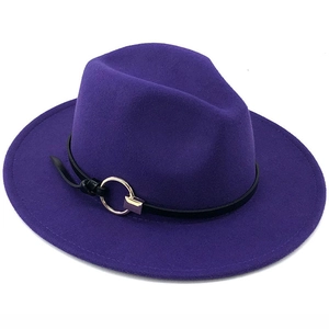Detail of dark purple wool fedora hat featuring a black leather belt and gold metal ring