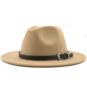 Close-up of wool fedora hat with black leather band and antique metal leaf buckle