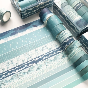 Set of 12 blue washi tapes with wave and mountain patterns for creative DIY journals