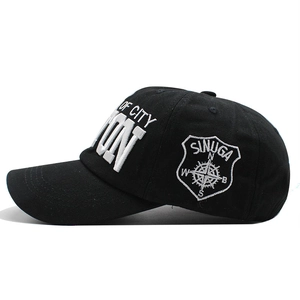 Black cotton baseball cap with white OF CITY embroidery and shield logo on the side