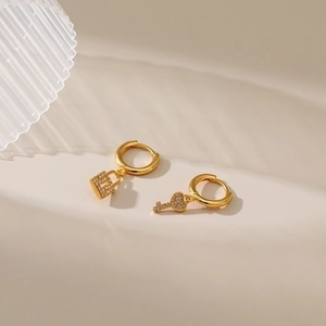 18K gold-plated asymmetrical hoop earrings with zircon heart lock and key charms