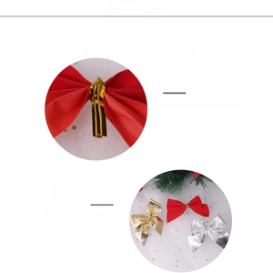 Detail of red velvet and metallic gold Christmas bows with secure PET wire ties for wreaths